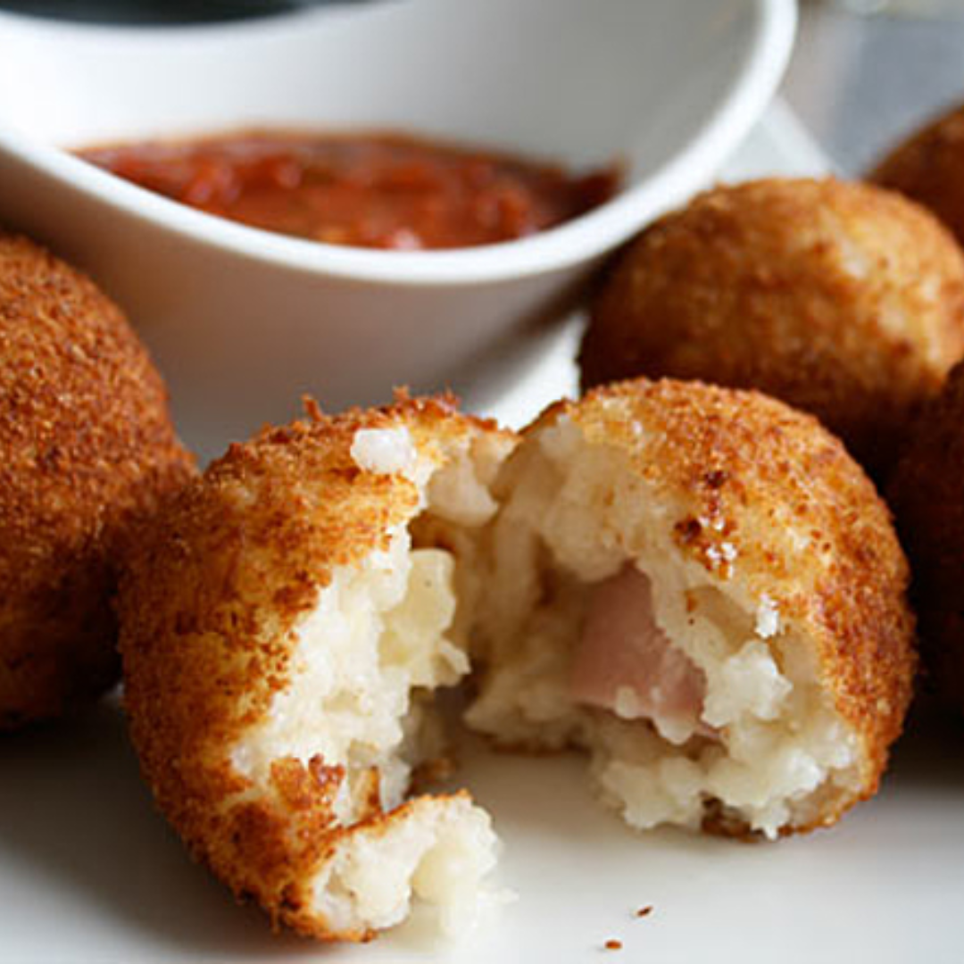 Arancini balls with dipping sauce from The Social Cafe in Emerald QLD 4720 – catering available with minimum orders.