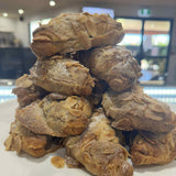 Almond croissant available at The Social Cafe in Emerald QLD 4720 – takeaway or dine-in from the cake cabinet.