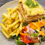 Beef lasagna served with chips and fresh salad from The Social Cafe in Emerald QLD 4720 – available for catering and takeaway.