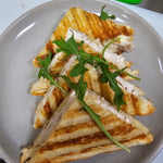 Build your own toasted sandwich with ham, chicken, cheese, avocado, tomato, onion, pineapple, and mayo at The Social Cafe in Emerald QLD 4720.