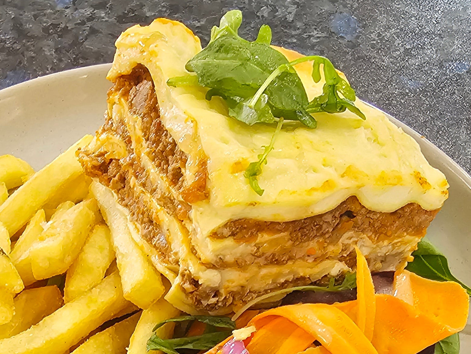 Homemade beef lasagna from The Social Cafe in Emerald QLD 4720 – available for catering and takeaway.