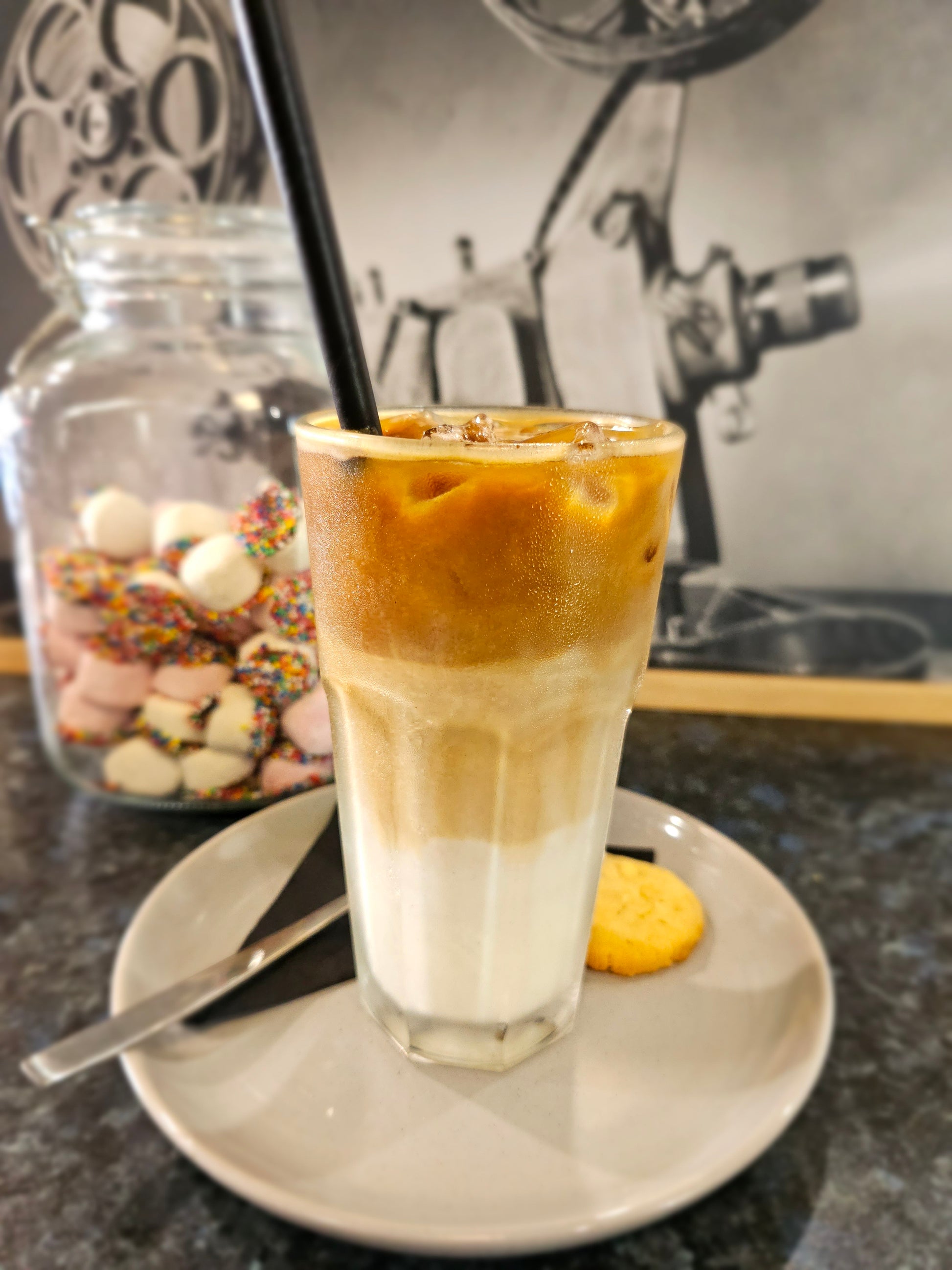 Iced latte, mocha, and long black coffee from The Social Cafe in Emerald QLD 4720 – served over ice for takeaway or dine-in.