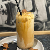 Iced Teddy Graham Latte with graham cracker flavours from The Social Cafe in Emerald QLD 4720 – takeaway or dine-in refreshing coffee drink.